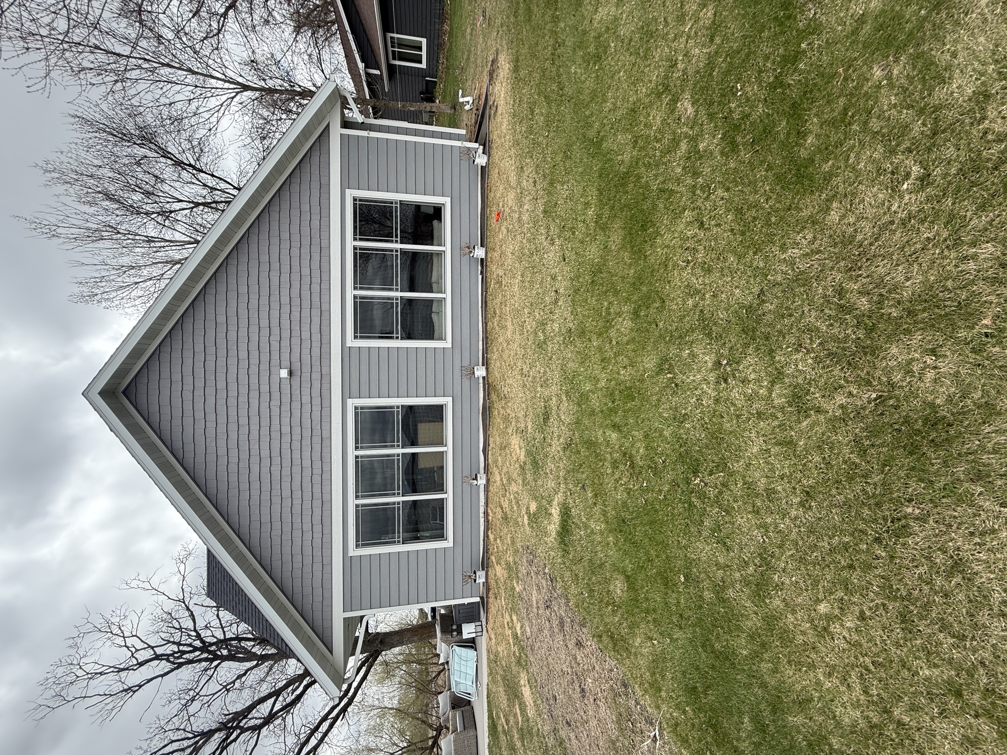 Residential property exterior with maintained landscape